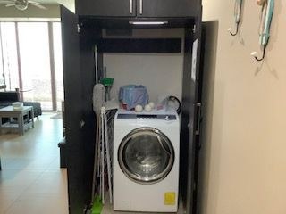   Washer Dryer Hidden In Its Own Closet. 