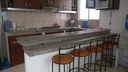 Granite Bar With Lots Of Stools