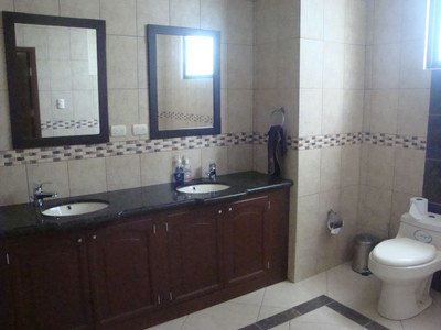 26 Guest Bathroom With Double Bowl Sinks.jpg