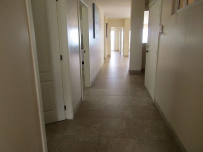   Long Hallway To The Bedrooms 