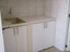   Cabinets And Sink In Laundry Room 