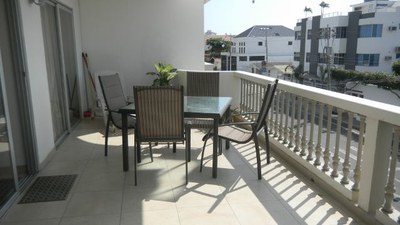 Large Balcony With Table and Chairs  