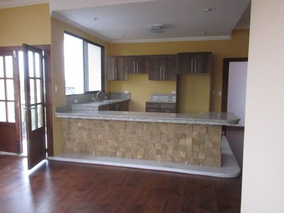  Kitchen With Bar And Decorative Stone. 