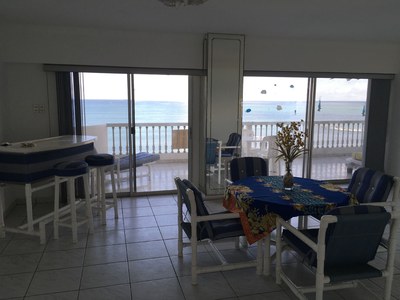  View Of Living Room Through To The Ocean From Entryway  