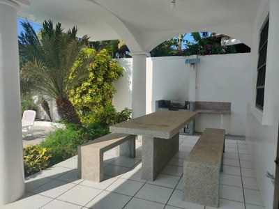 Concrete Table And Benches Near BBQ Area