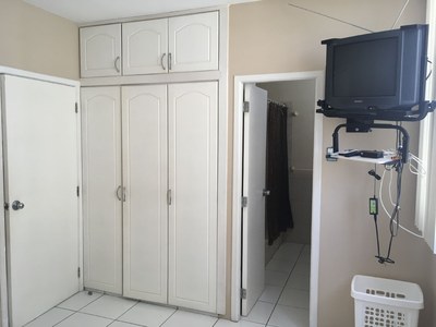 Second Bedroom Closets And Television.