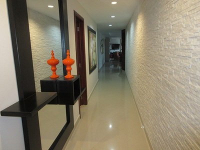   Long Entry Way With New Tiled Wall 