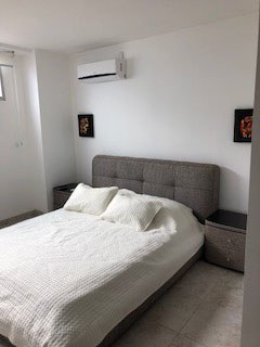 Master Bedroom With Air Conditioning