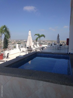 View Over Jacuzzi To Lounging Area