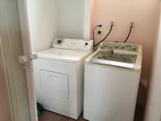 Laundry Room With Full Size Washer And Dryer