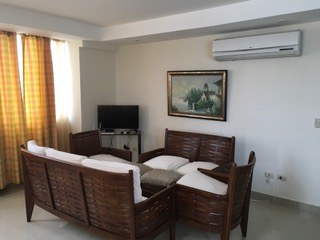 Living Room With TV And AC