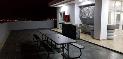Rooftop Terrace Wet Bar And Tables For Al Fresco Dining