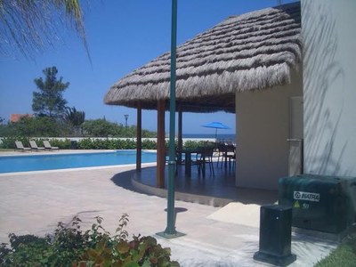 Seating Area Under Palapas By Pool