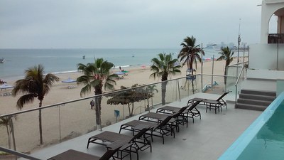 Seating Deck With Lounge Chairs On The Beach