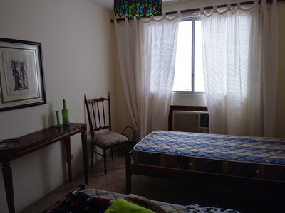 Second Bedroom Has Large Windows And Air Conditioner