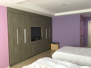 Closets And Television In Fourth Bedroom