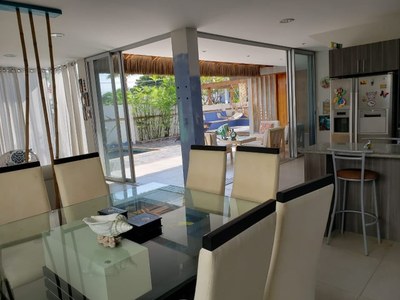 View From Dining Room Toward Living Room And Poolside Patio