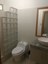 Bathroom Has Cool Tiled Shower