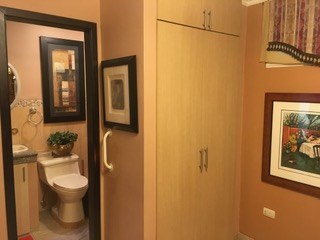 Closet And Door To Private Bathroom For Second Bedroom