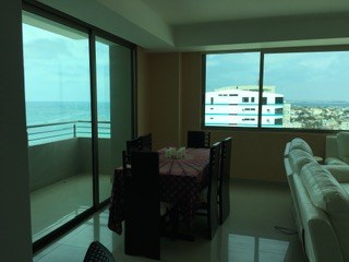 Dining Area And Sliding Glass Doors To Front Balcony