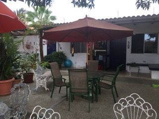  Two Sets Of Outdoor Table And Chairs