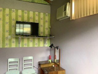 Television And Air Conditioner In Second Bedroom
