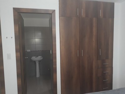 Master Bedroom's Closet And Door To Master Bathroom