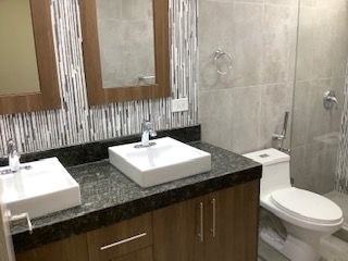  Dual sinks in master bathroom.