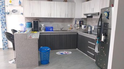 Open kitchen with lots of cabinets.jpg
