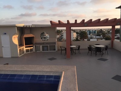 Pool View Of BBQ And Pergola Area