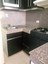 Granite Counters And Backsplash In Kitchen