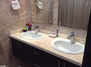 Master Bathroom with Double Sinks and Nice Granite Counter Top 