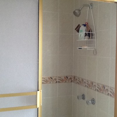 12 master bathroom shower glass door.JPG