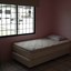 18 fourth bedroom bed and window.JPG