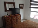 Master Bedroom with TV and Dresser