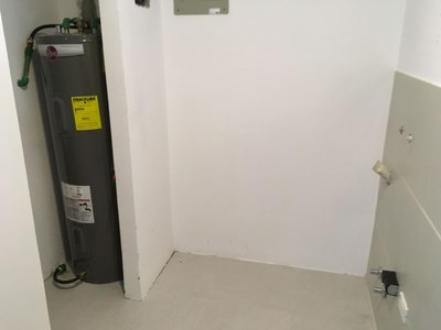 Laundry Room With  Full Size Hot Water Heater