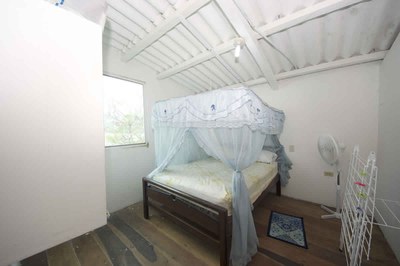 Amazing Ecuadorian Style Beachfront House-Guest bedroom.jpeg