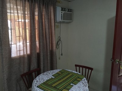  Dining Room Table And Air Conditioner 