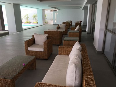   Lounge Area By Infinity Pool. 