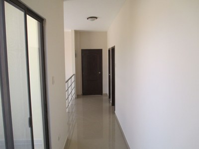 Upstairs Hallway with roof top terrace access.jpg