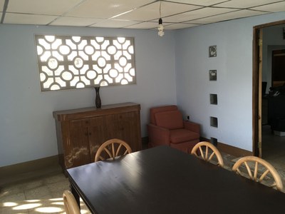   Dining Room With Additional Furniture. 