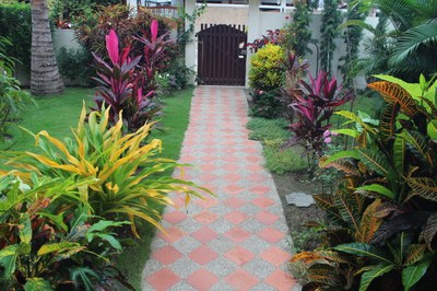 Landscaped path to gate