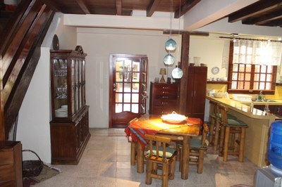 Indoor dining area with a view to the back door