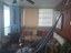 Living Room With Ceiling Fans And Hammock