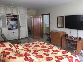 Master Bedroom Has Large TV