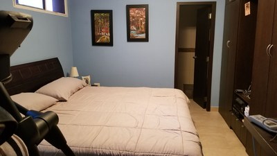 Second Master Bedroom With King Sized Bed.