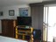 Room For Television And Chest Of Drawers