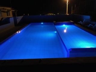   Night Time Swimming With Great Lighting 