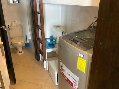 Laundry Area And Service Bathroom