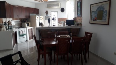 View Of Dining Area And Kitchen